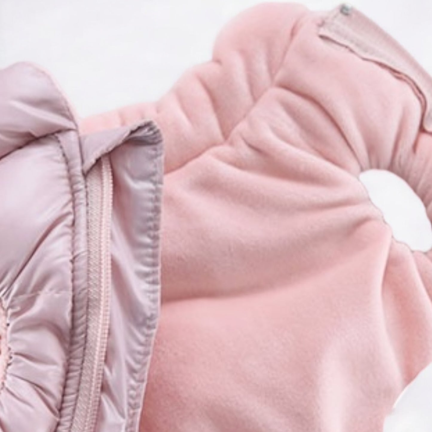 Zip-Wellon-Daunenweste